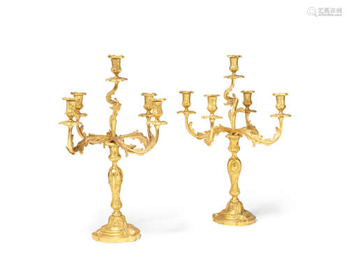 Early 20th century A pair of Louis XV style gilt bronze five light candelabra