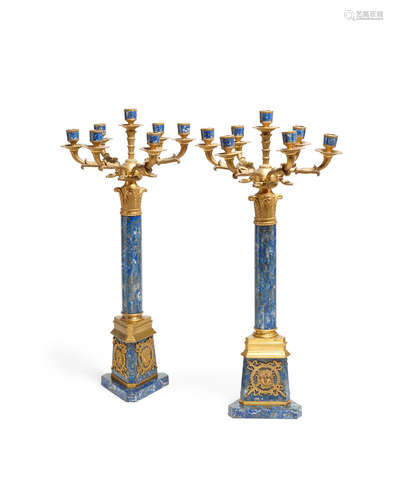 A pair of Empire style gilt bronze and lapis lazuli seven light  candelabra