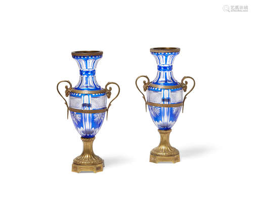 A pair of Neoclassical style bronze mounted blue cut to clear glass vases