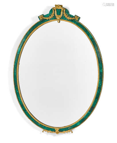 20th century A Napoleon III style gilt bronze mounted malachite oval mirror