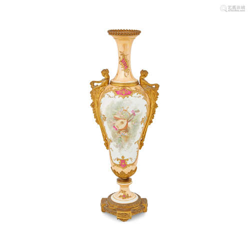 Fourth quarter 19th century A Louis XVI style gilt bronze mounted polychrome enameled urn