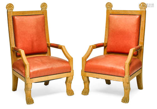 Circa 1940height 49 1/4in (125cm); width 27in (68.5cm); depth 27 1/2in (69.8cm)  A pair of Jean Charles Moreux Style Cerused Oak and Leather Armchairs