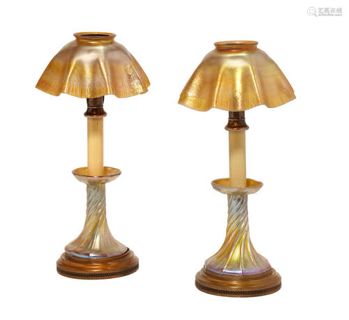 Early 20th century A Pair of Tiffany Studios Favrile glass candlestick lamps