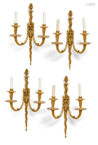 20th century A set of four neoclassicals style gilt bronze two light sconces