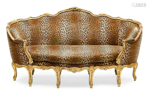 Fourth quarter 19th century A Louis XV Style Giltwood Canapé