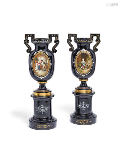 A pair of Gilt, Enamled, and engraved dark amethyst glass pedestal vases