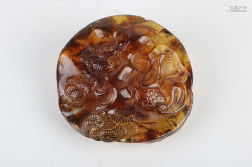 A Chinese Carved Amber Pendant