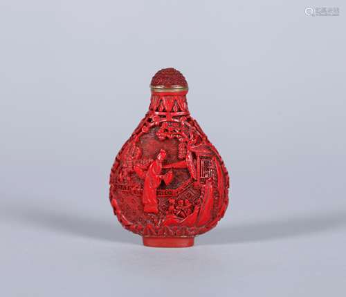 A Chinese Carved Tixi Lacquer Snuff Bottle