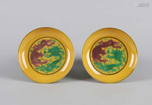 A Pair of Chinese Yellow Ground San-Cai Porcelain Plates