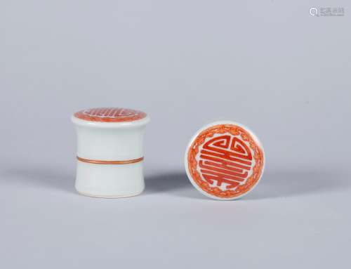 A Pair of Chinese Iron-Red Porcelain Scroll Heads