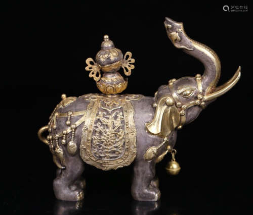 A SILVER ELEPHANT ORNAMENT WITH PARTIAL GILT SILVER