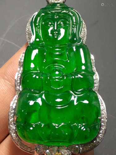 A GREEN JADEITE CARVED 