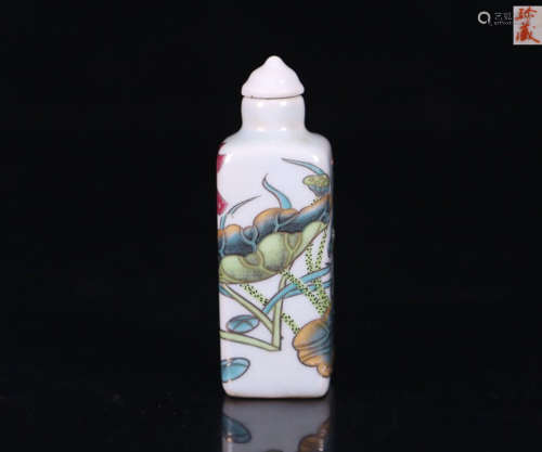 A FAMILLE ROSE SNUFF BOTTLE WITH MARK AND LOTUS DESIGN
