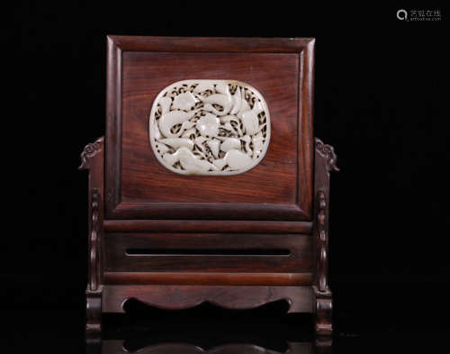 A RED WOOD SCREEN WITH PHOENIX CARVED AND HETIAN JADE EMBEDDED