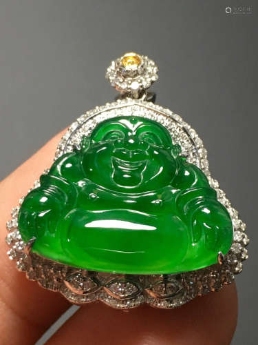 A GREEN JADEITE CARVED 