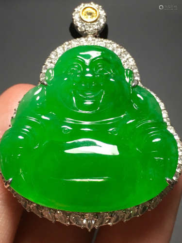 A GREEN JADEITE CARVE  