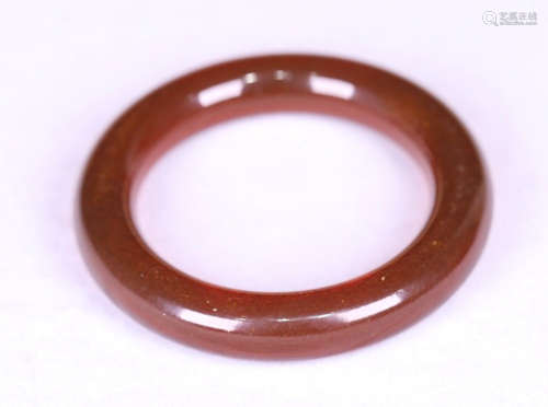 A QING DYNASTY STYLE  AMBER BANGLE
