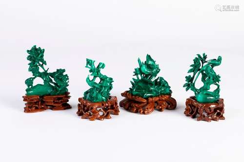 CHINE. Lot de quatre SUJETS en malachite sculptée …