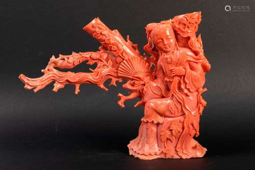 CHINE. BRANCHE de corail orange sculptée figurant …