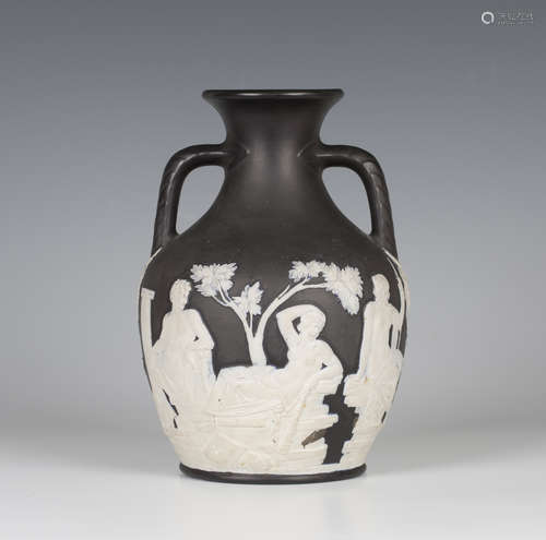 A jasperware black ground Portland vase, probably Wedgwood, 19th century, typically decorated in