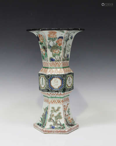 A Chinese famille verte porcelain trumpet beaker vase (gu), late Qing dynasty, of hexagonal section,