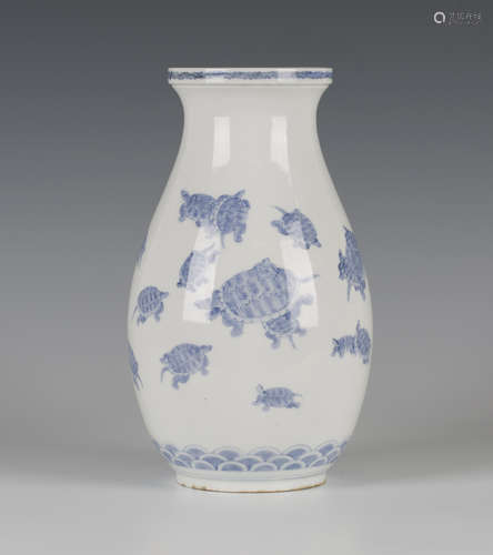 A Japanese Hirado blue and white vase, Meiji period, the ovoid body and flared neck painted with