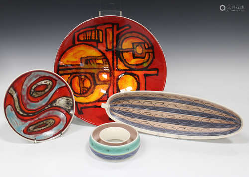 A large circular Poole pottery Delphis range dish, 1969-75, decorated by Carol Cutler,