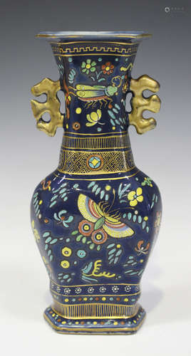 A Chinese blue glazed porcelain vase, late Qing dynasty, of hexagonal baluster form, enamelled