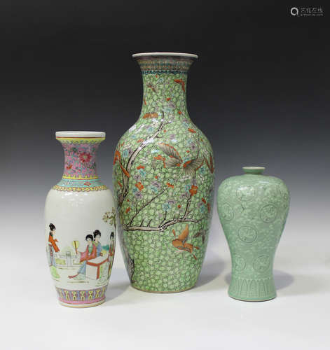 A Chinese famille rose enamelled green ground porcelain vase, early 20th century, the shouldered