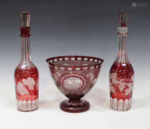 A Bohemian ruby flashed and engraved glass circular footed bowl, early 20th century, decorated