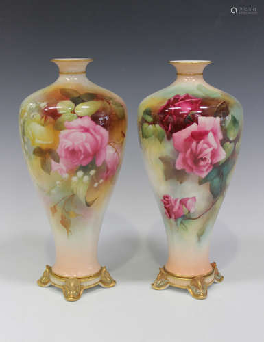 Two similar Royal Worcester porcelain vases, early 20th century, painted by H. Martin, one painted