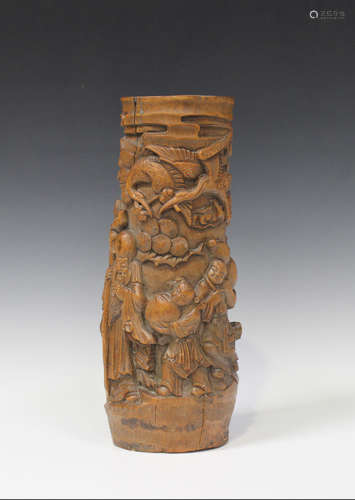 A Chinese bamboo brush pot, probably late Qing dynasty, carved in relief with Shoulao and two