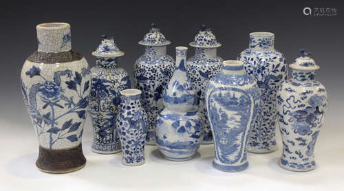 A Chinese blue and white porcelain double gourd shaped vase, mark of Kangxi but late 19th century,