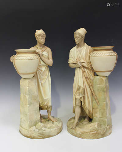 A pair of Royal Worcester Arab water carrier figures, circa 1887 and 1888, modelled after Hadley, as