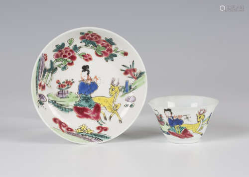 A Chinese famille rose porcelain wine cup and saucer, Yongzheng period, each piece painted with a