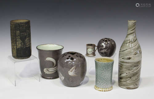 Four pieces of Fishley Holland studio pottery, each decorated with birds on a grey glaze, comprising