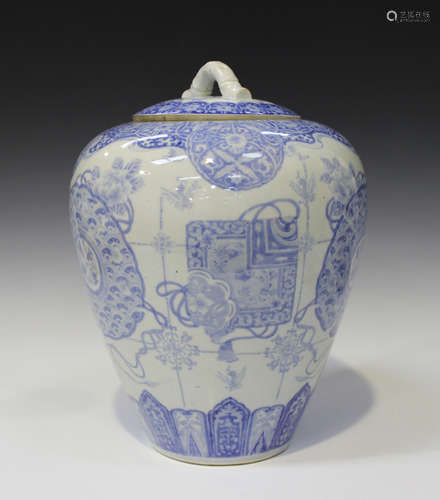 A Japanese Hirado blue and white porcelain jar and cover, Meiji period, the ovoid body painted