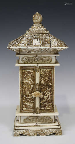 A Japanese carved and stained ivory zushi (portable shrine), Meiji/Taisho period, the roof top