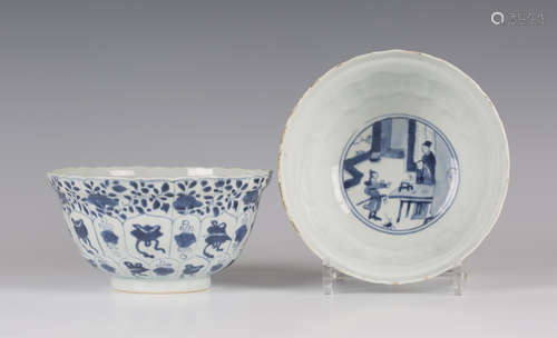 A pair of Chinese blue and white porcelain bowls, Kangxi period, of moulded circular form, each