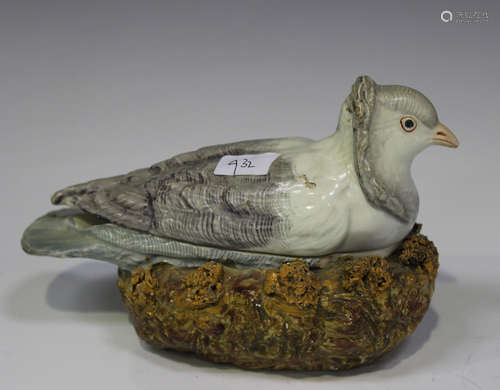 A Staffordshire pearlware tureen and cover in the form of a dove, early 19th century, the base