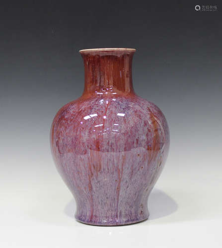 A Chinese flambé glazed porcelain vase, late Qing dynasty, the stout baluster body and short