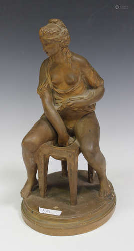 A terracotta pottery figure after Pradier, early 20th century, modelled as a woman in intimate