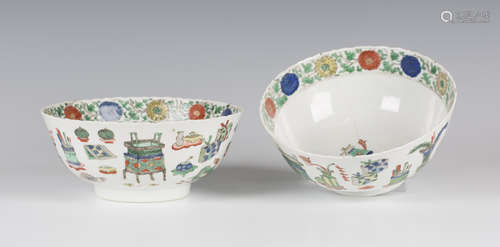 A pair of Chinese famille verte porcelain bowls, Kangxi period, each of steep-sided circular form