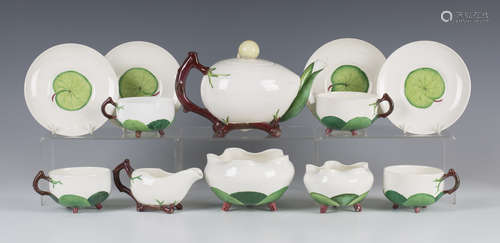 A rare Minton Aesthetic white glazed majolica déjeuner set, circa 1879-1880, comprising a coconut