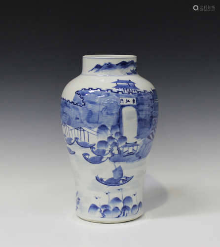 A Chinese blue and white porcelain vase, mark of Kangxi but late 19th century, the baluster body