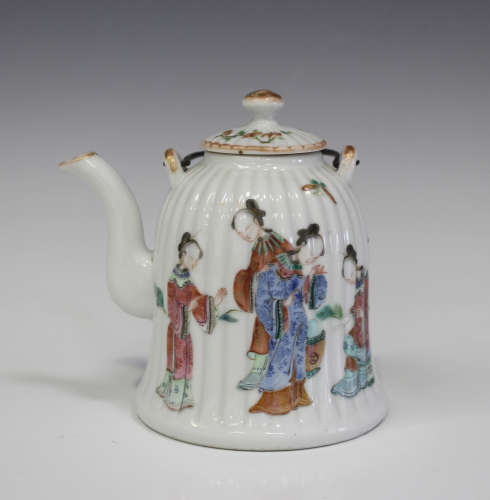 A Chinese famille rose enamelled porcelain teapot and cover, late Qing dynasty, of vertically ribbed