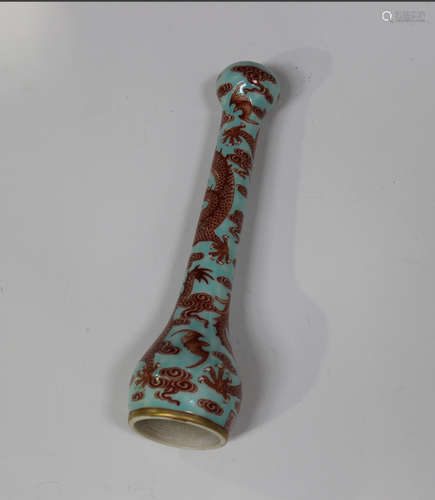 A Chinese iron red and turquoise decorated porcelain brush handle, mark of Qianlong but probably