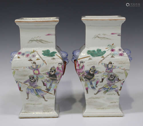 A pair of Chinese famille rose enamelled porcelain vases, mark of Qianlong but later, each