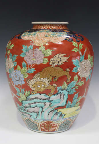 A Japanese Imari porcelain vase, Meiji period, the stout ovoid body painted and gilt with four