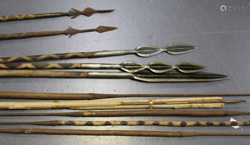 A group of African spears with bladed ends and pointed terminals.Buyer’s Premium 29.4% (including